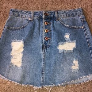 Ripped denim skirt